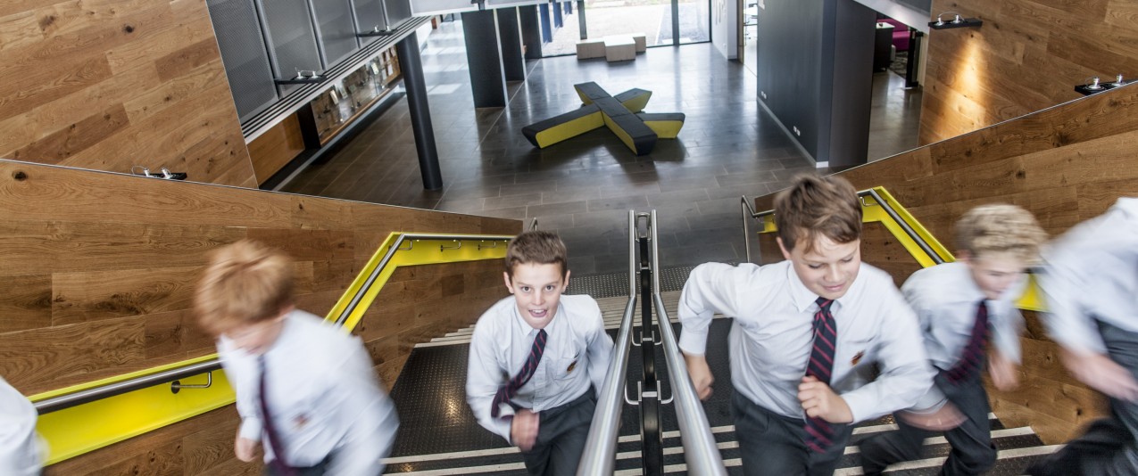 Boys run up stairs in new Brighton Grammar middle school