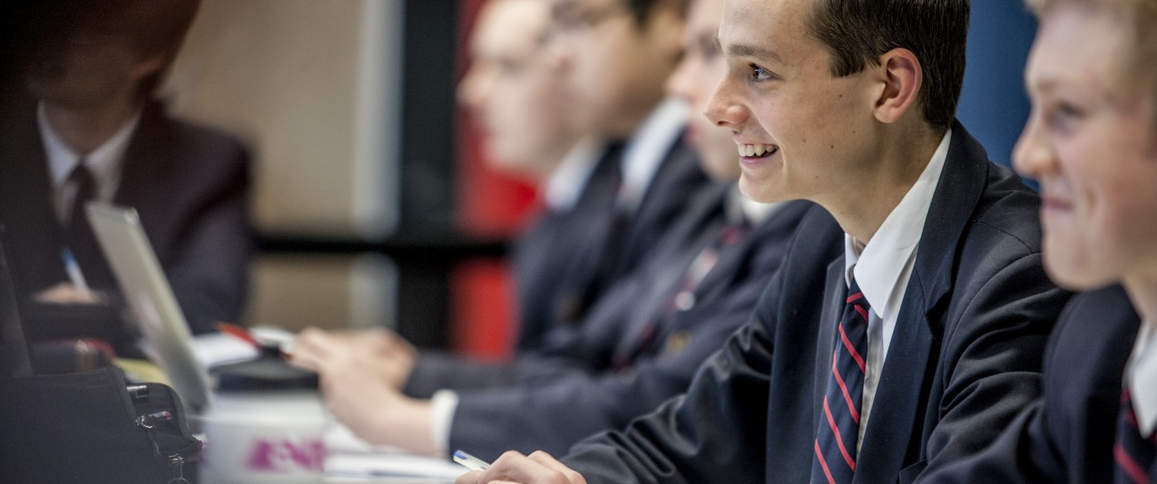 A happy Senior Brighton Grammar School Student in Class