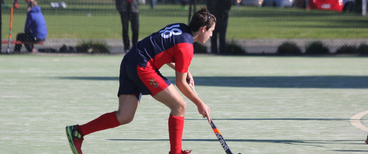 Brighton Grammar boy plays Hockey against Wesley College in APS competition